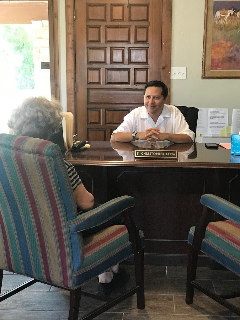 A Plus Cremation Owner and Founder Chris Tapia speaking with a Client about their Pre-planning Cremation Services