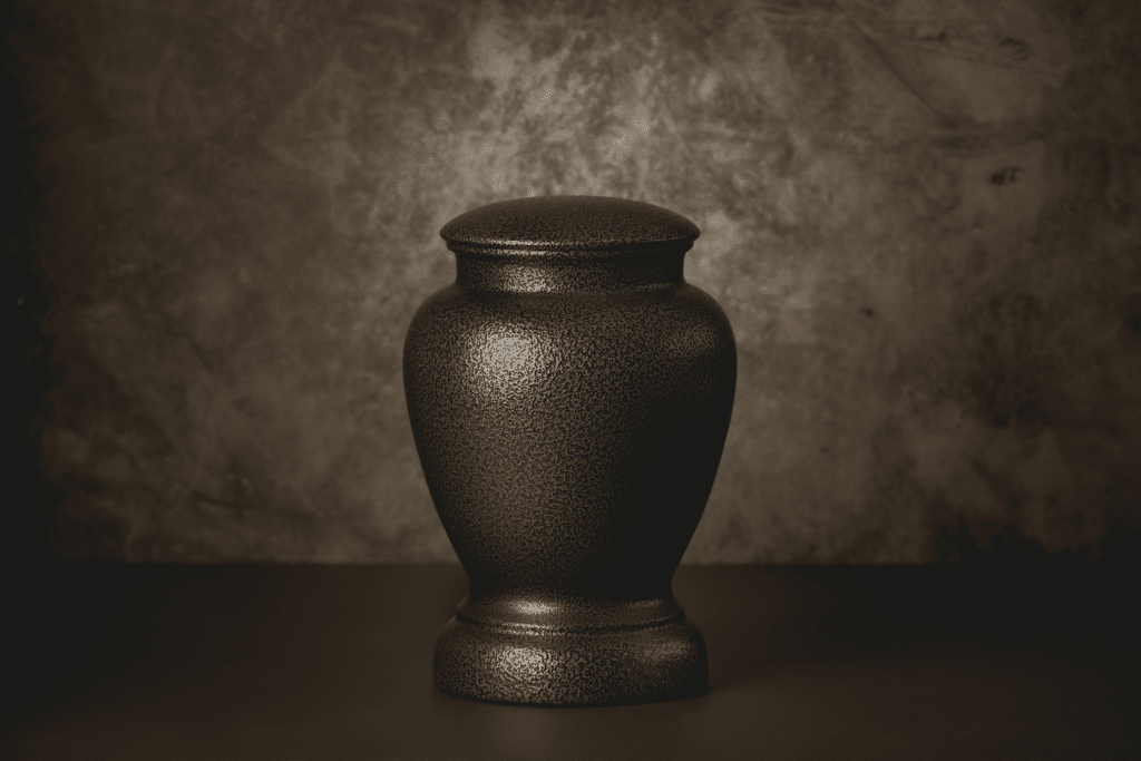 Image of a dark urn on a table
